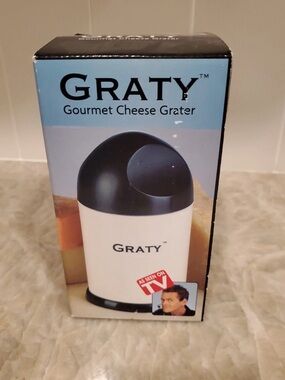 Graty Gourmet Cheese Grater for Cheeses, Nuts, Bread & Hard Eggs. Instructions.